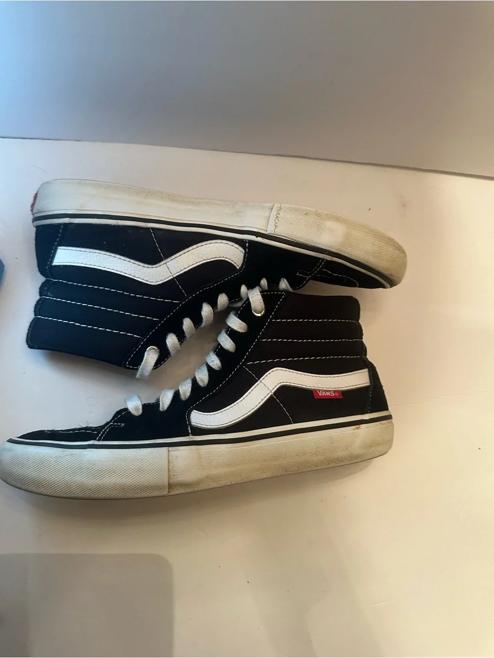 Vans Black & White High-Top Skate Sneakers